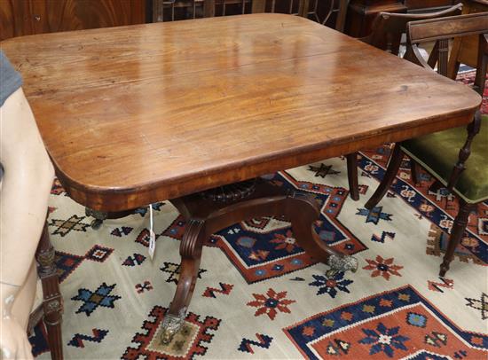 A Regency mahogany rectangular tilt top dining table W.132cm